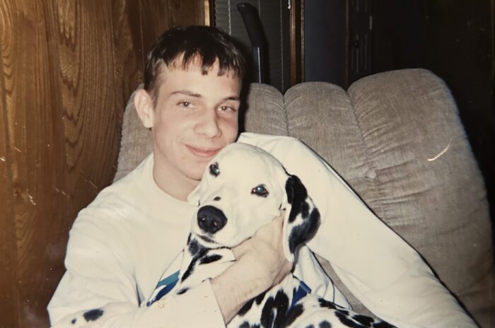 A photo of Jack Forman with a Dalmatian
